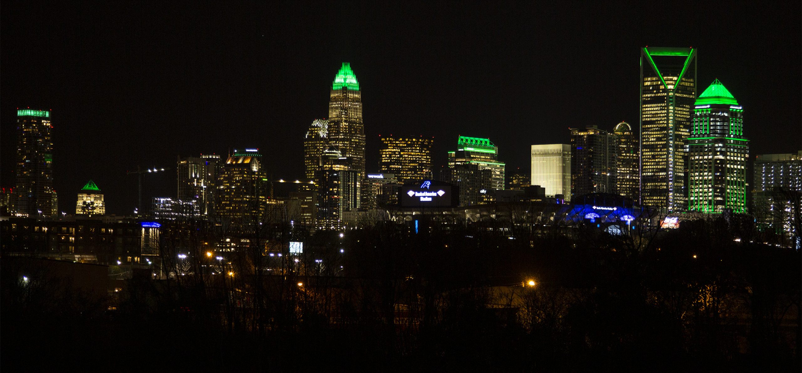 Charlotte skyline with green lights